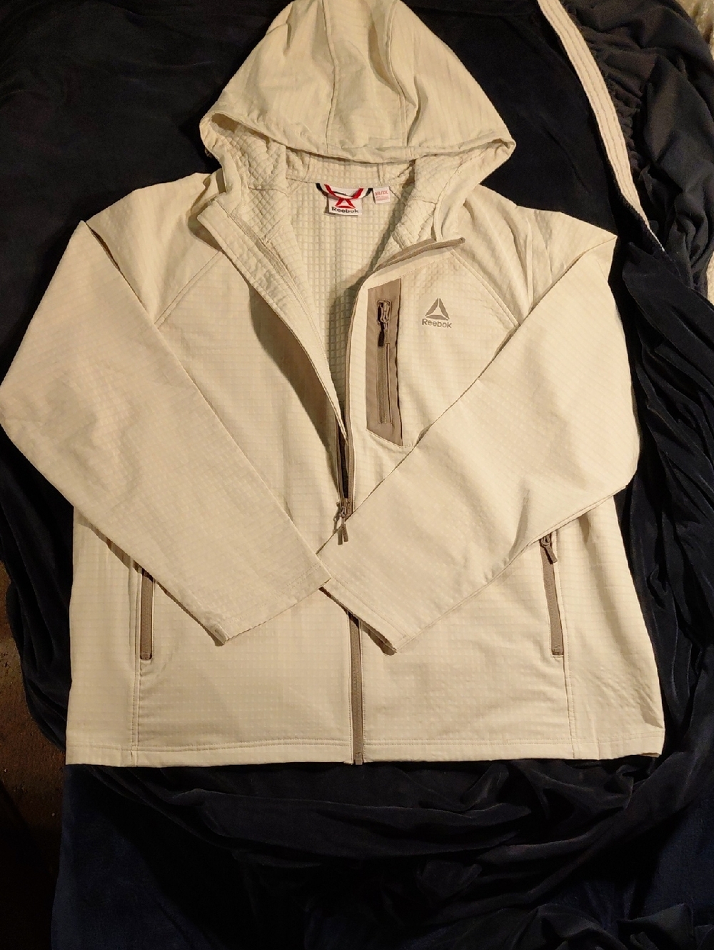 Reebok Men's Off White, Hooded, Textured Stretch Jacket with Zip Pockets